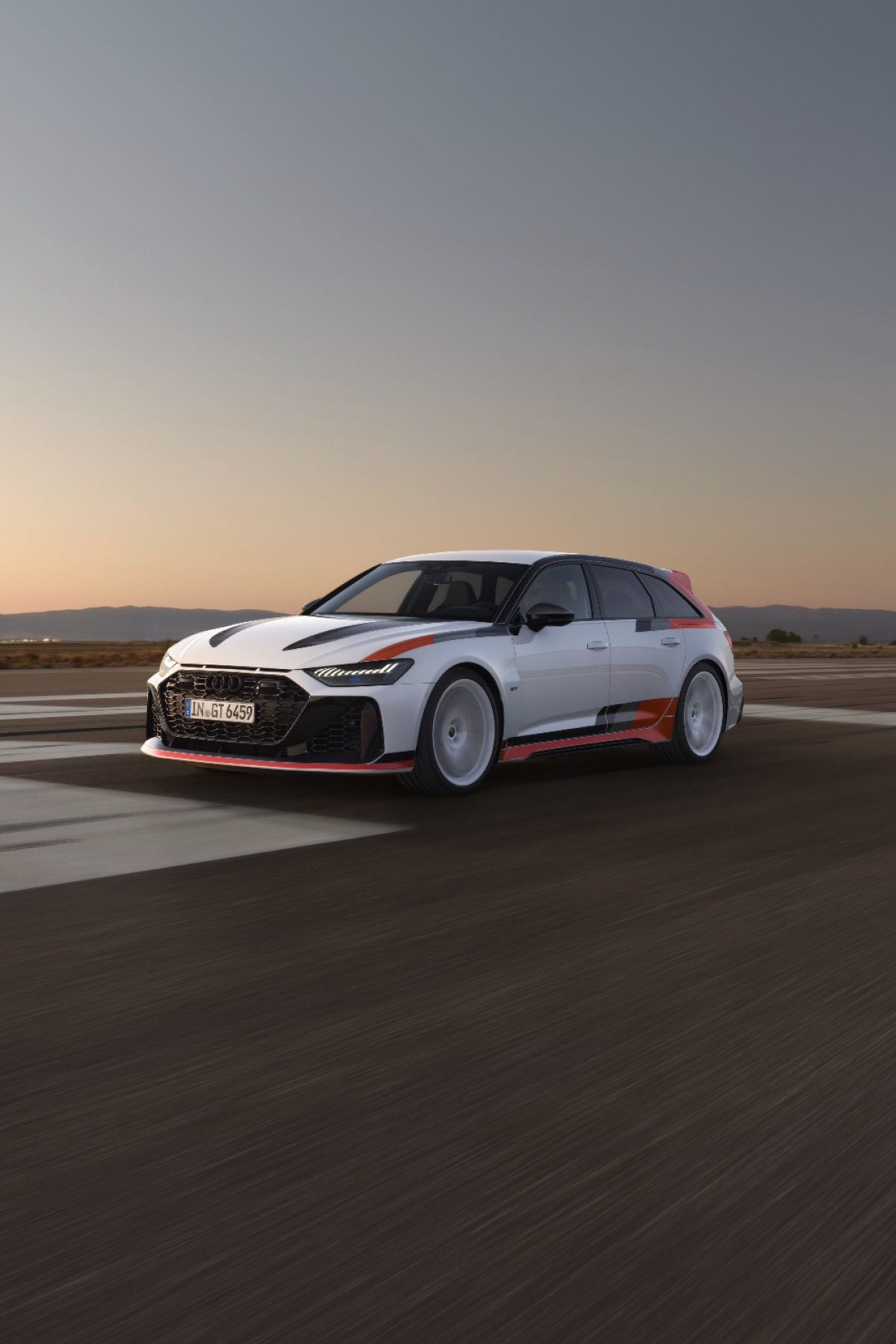 White Audi GT sports car on a racing road